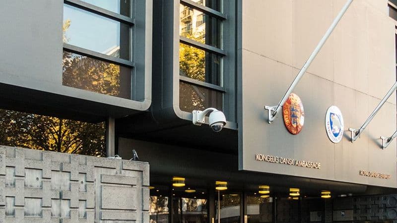 Security USA® officer stationed at a formal institutional entrance