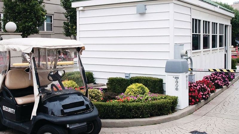 Image of a gated community security entrance. 
