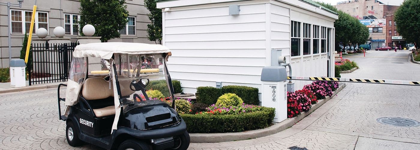 Image of a gated community security entrance. 