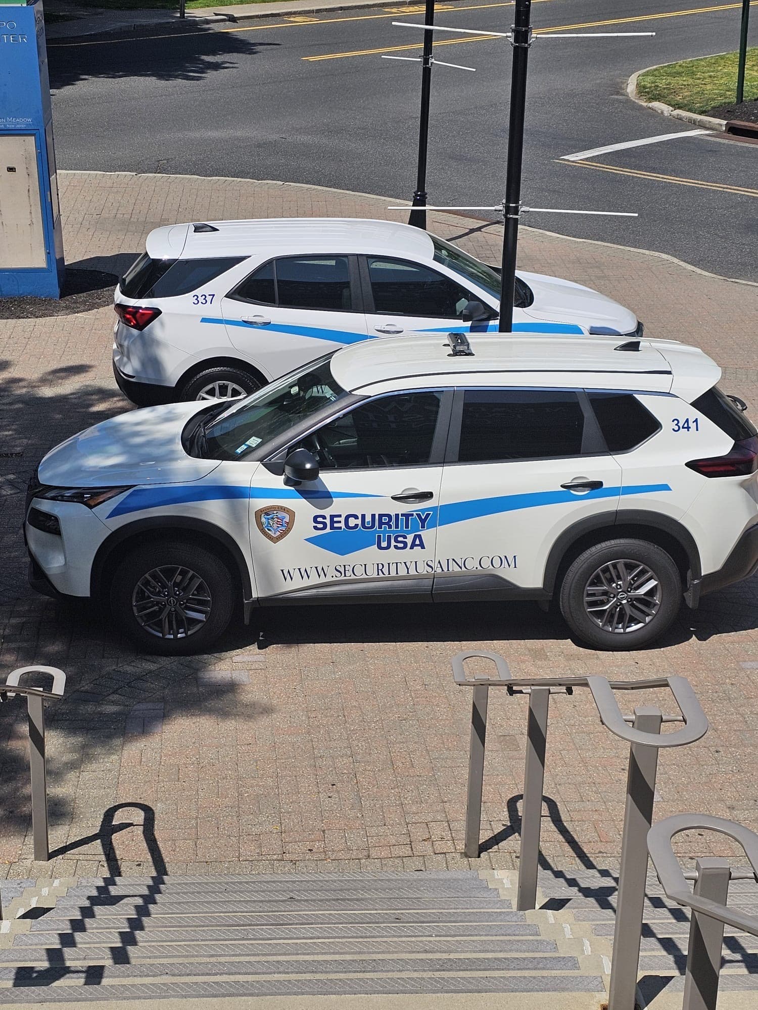 Image of marked Security USA® Inc. vehicles. 