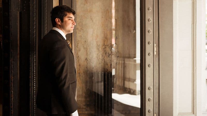 Image of a Security USA® doorman in residential building front entrance.