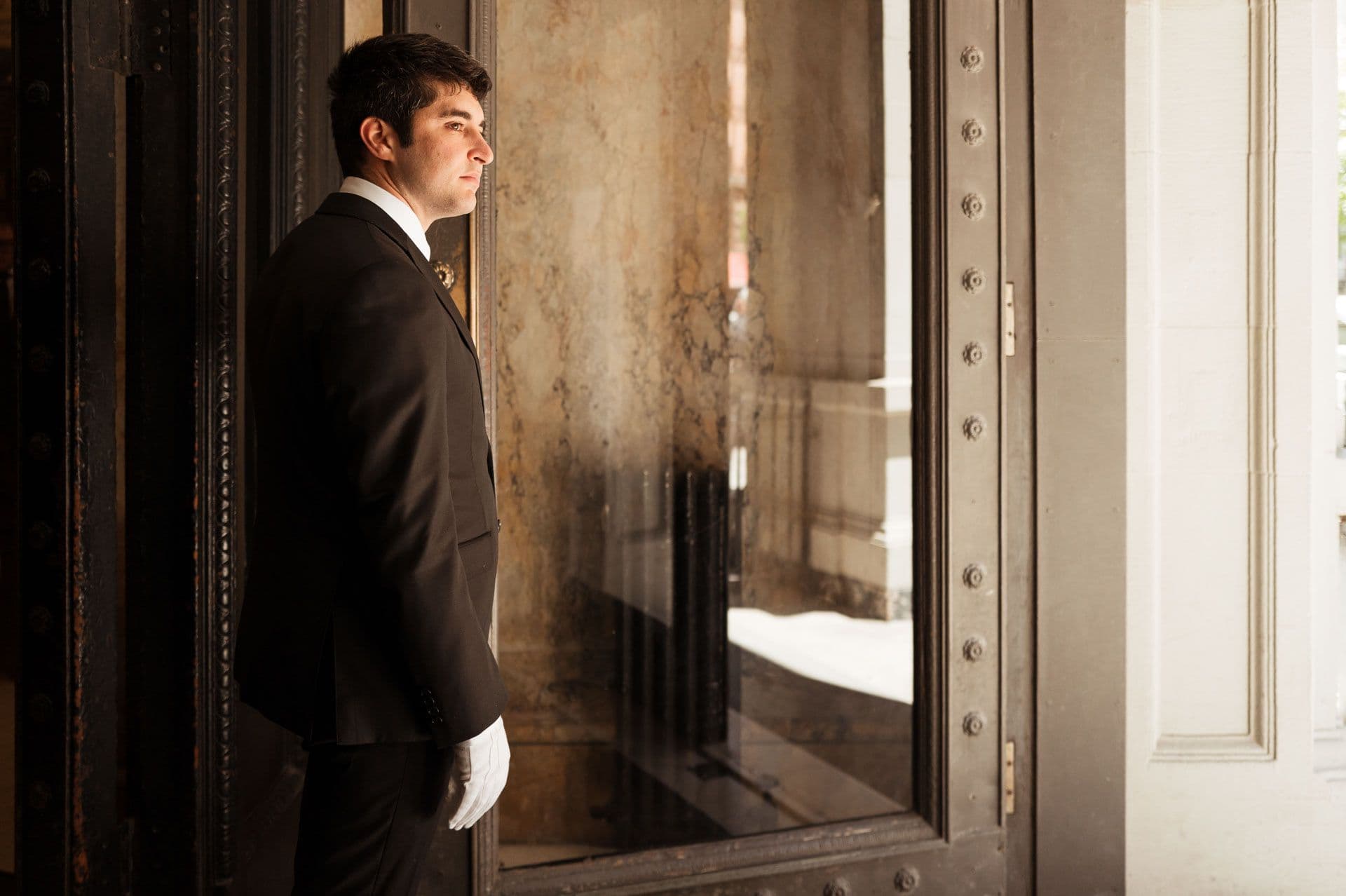 Image of a Security USA® doorman in residential building front entrance.
