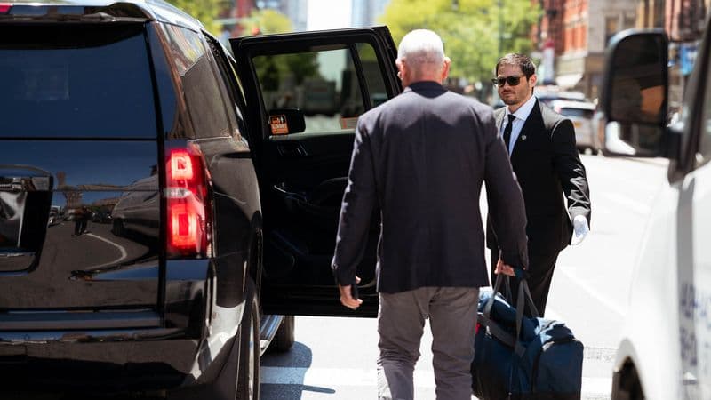 Security USA® white-glove valet attendant assisting a resident with vehicle service
