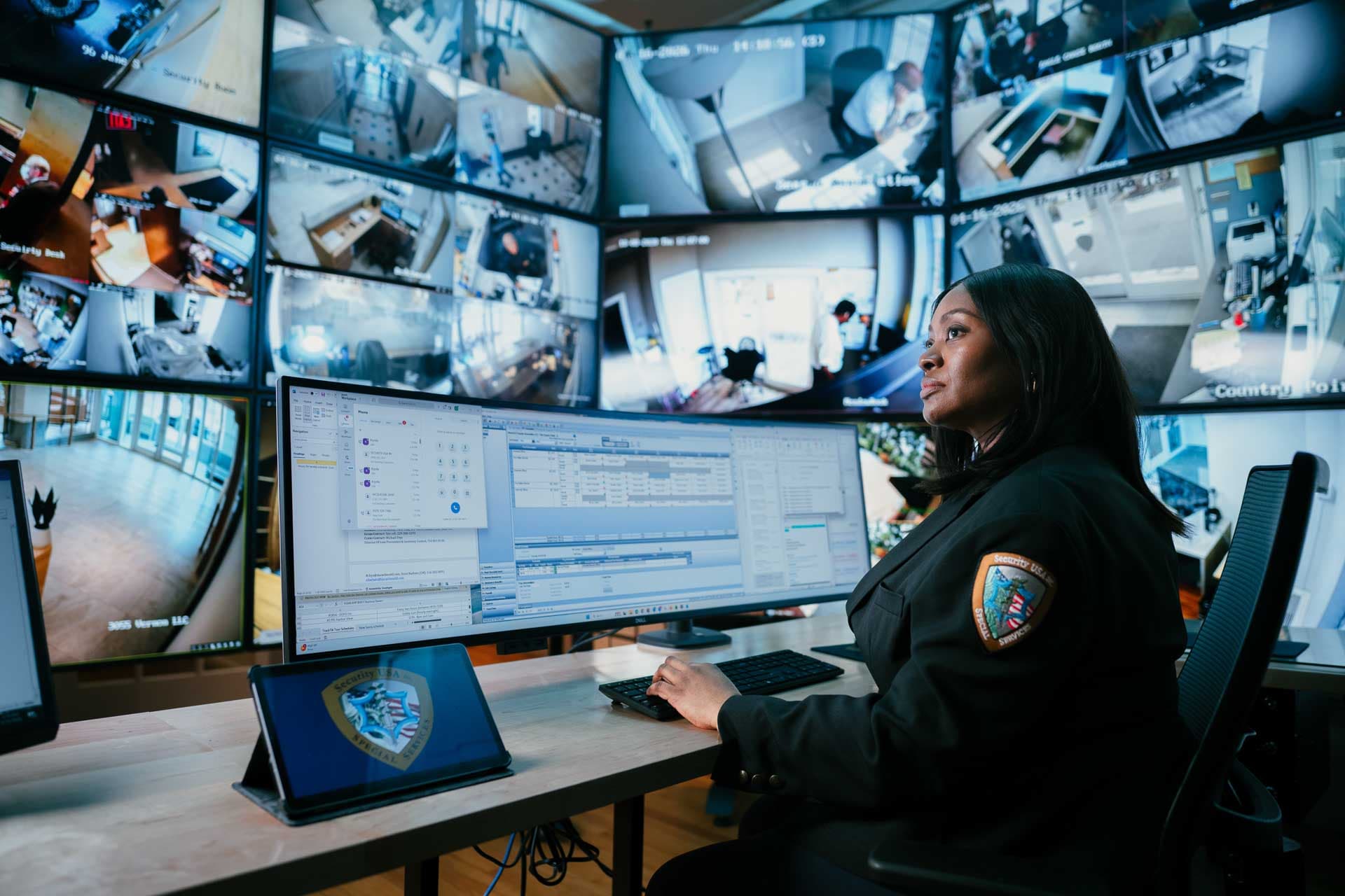 Image of Security USA® guard monitoring in command center.
