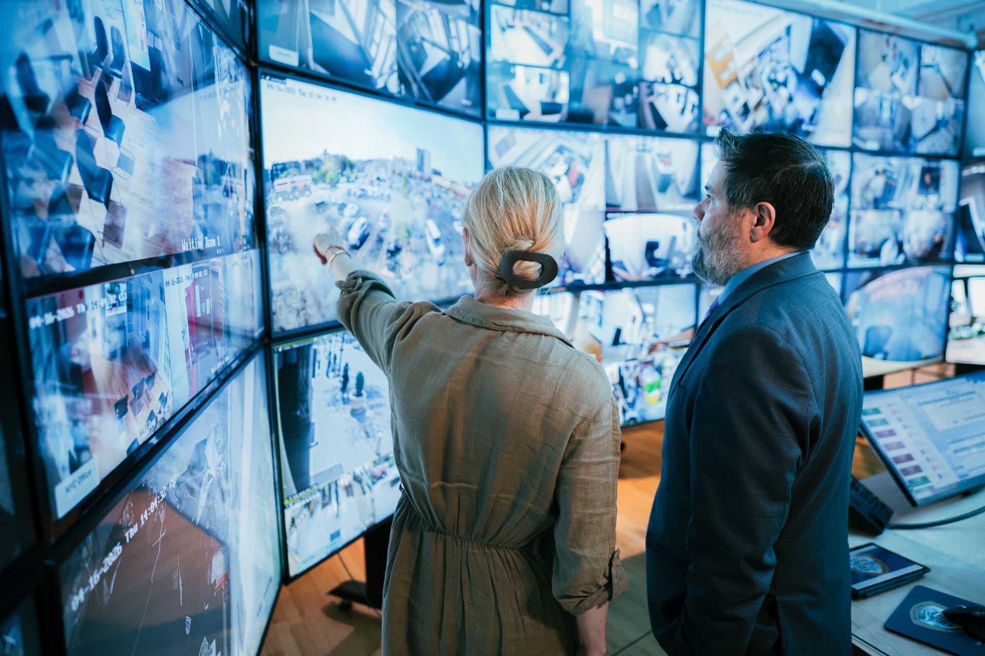 Image of Security USA® account managers monitoring screens in the command center.