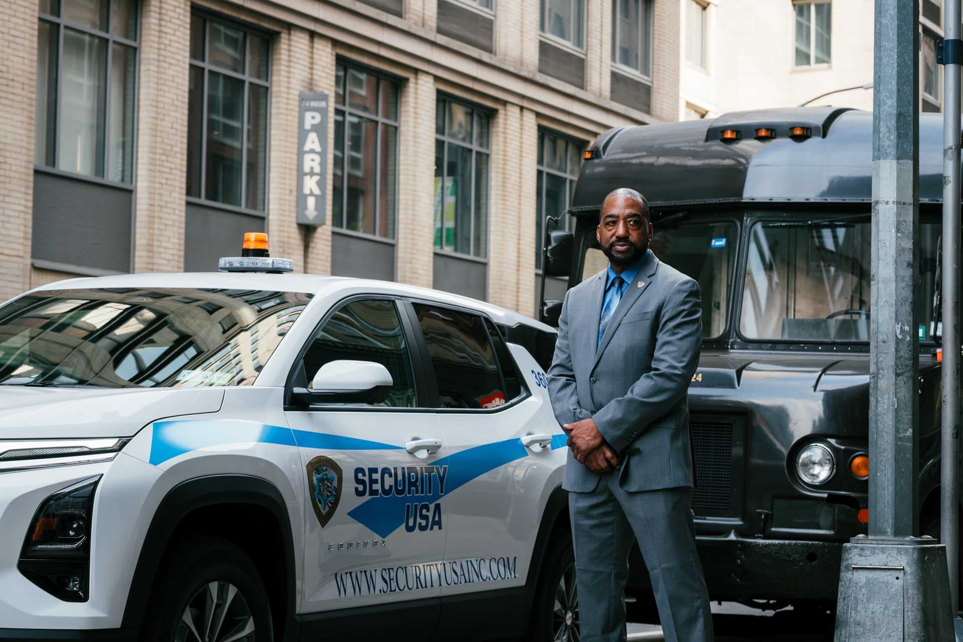 Image of a Security USA® guard patrolling the perimeter of a building.