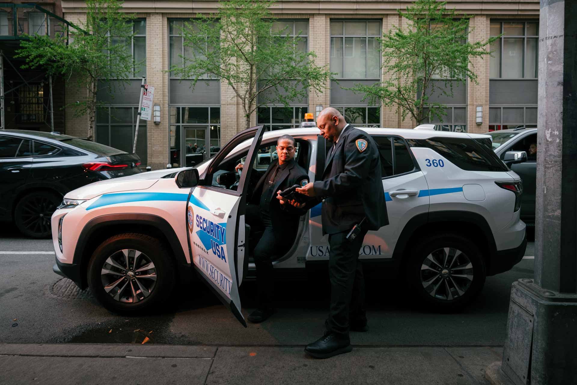 Security guards with patrol vehicles