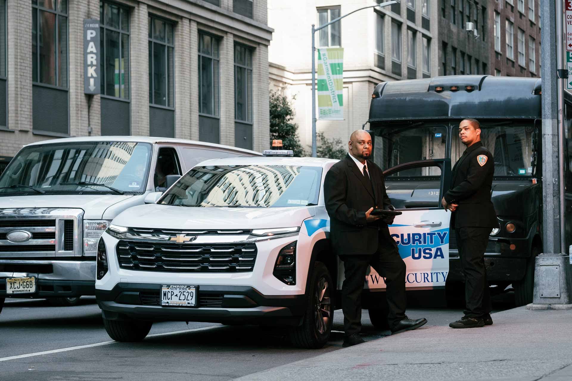 Security guards with a patrol vehicle on site