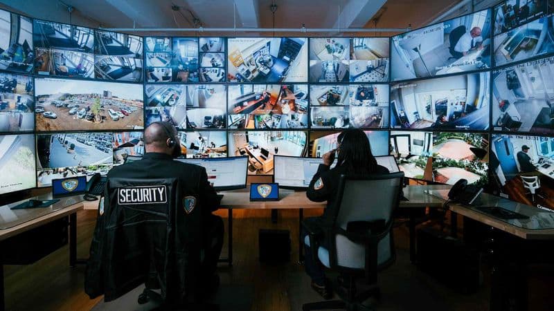 Image of Security USA® Security specialists monitoring in the command center.