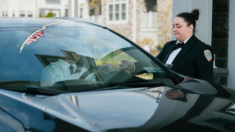 Image of a Security USA® valet attendant assisting a resident.