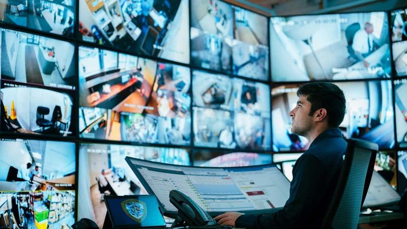 Image of a Security USA® data analyst monitoring in command center.