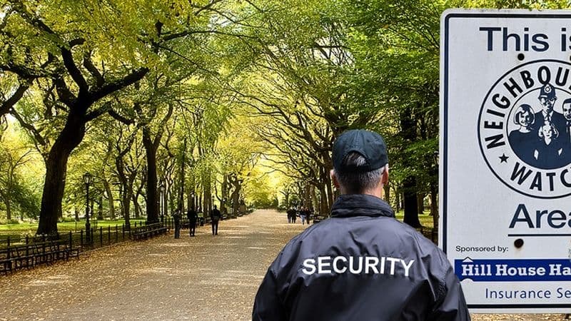 Image of Neighborhood watch security guard patrolling a city park.