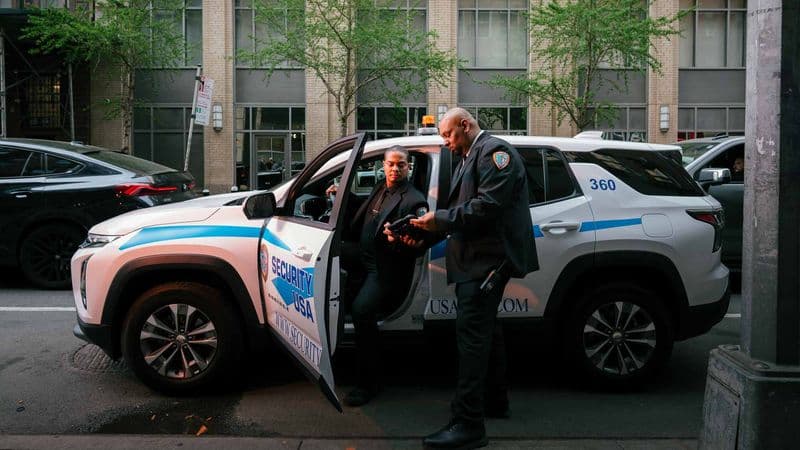 Security guards with patrol vehicles