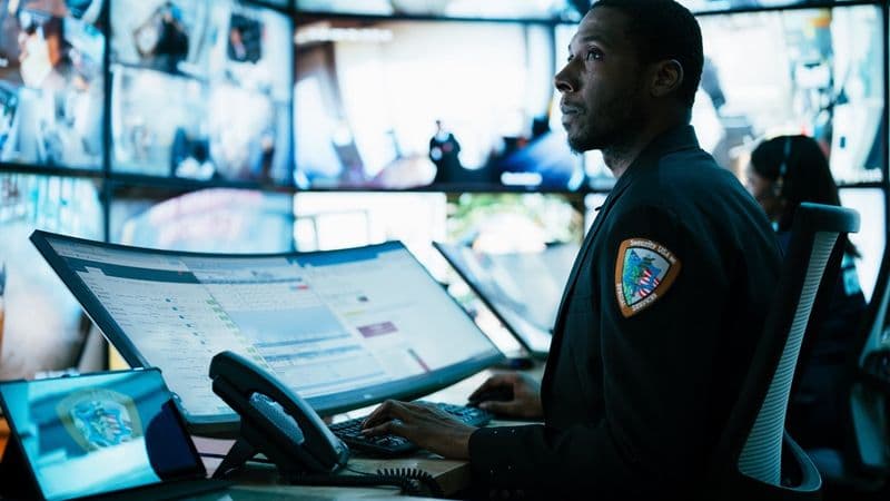 Image of retail loss prevention with CCTV surveillance and security personnel