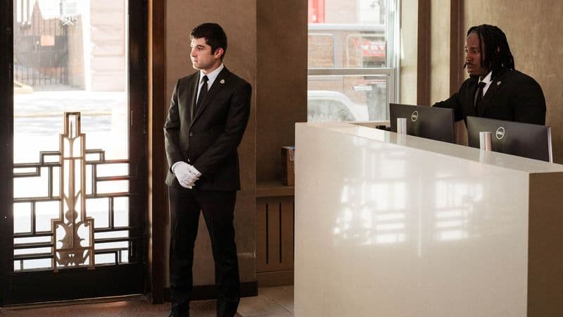 Image of a Security USA® doorman in residential building front entrance.